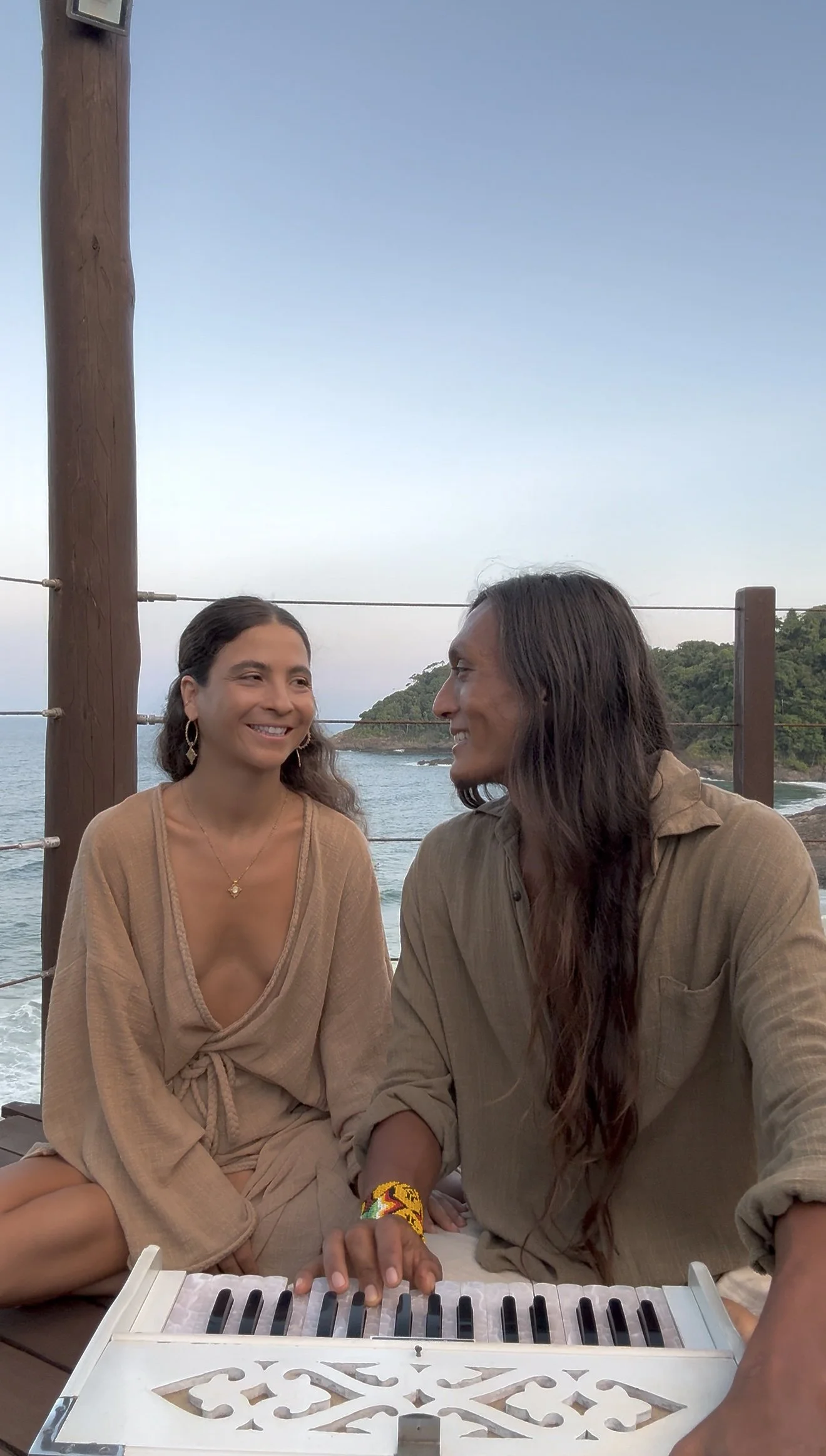 Allee and Hendry together by the ocean